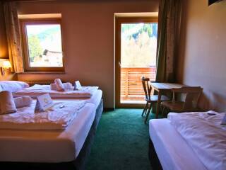 15. Catered chalet Alpensport Saalbach Hinterglemm Driepersoonskamer